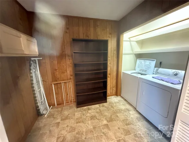 a view of walk in closet with furniture