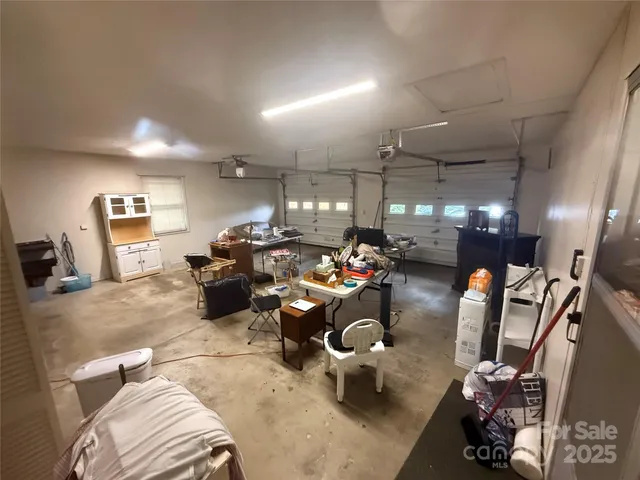 a room with gym equipment and a mirror