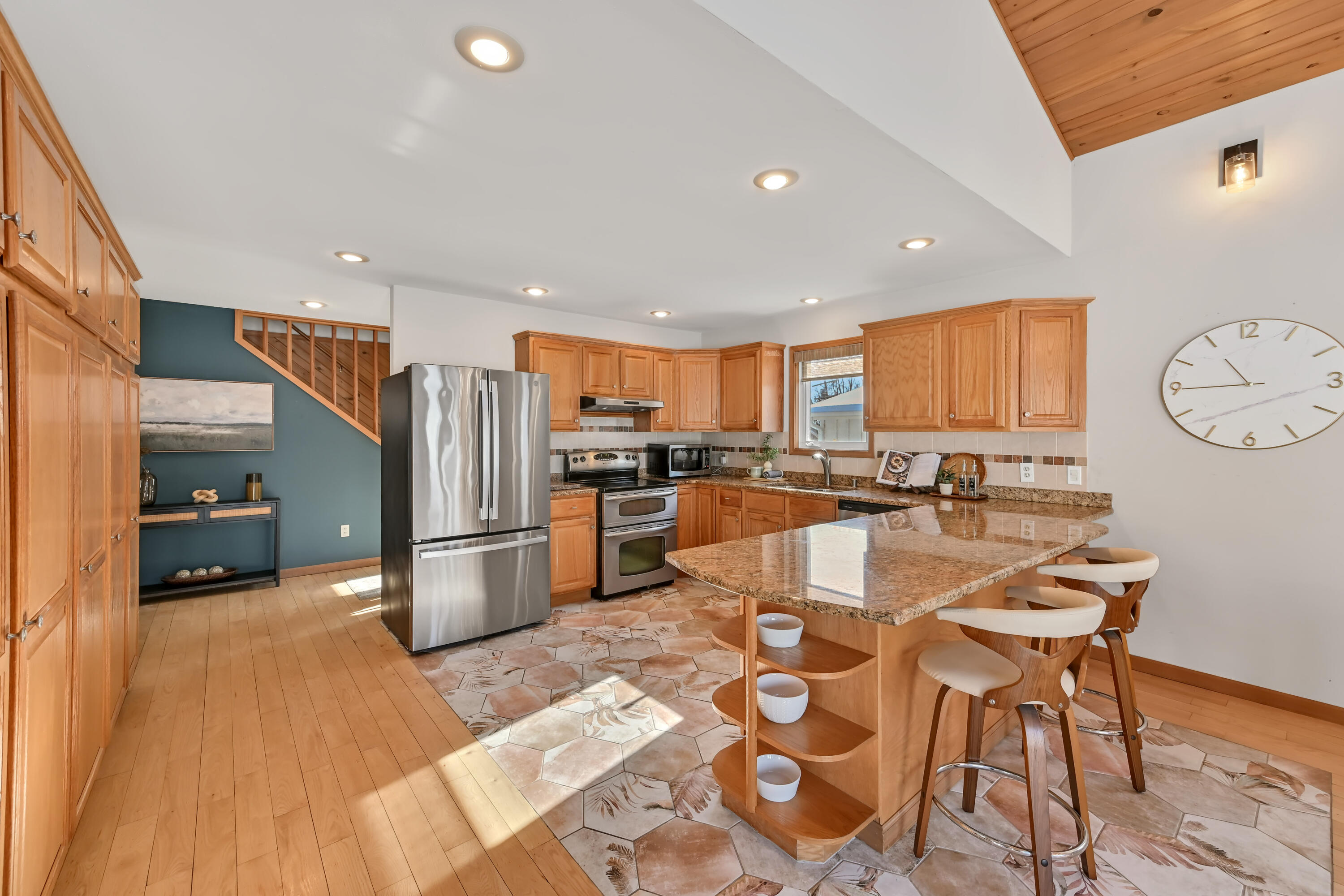 2135 West Shore Drive Delafield, WI 53018 - Photo 3 of 49 Warm and open kitchen
