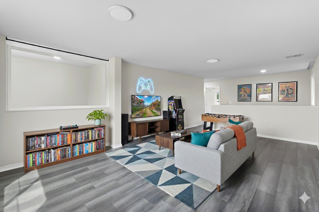 Undisclosed Address Austin, TX 78747 - Photo 11 of 28 a living room with furniture and a wooden floor