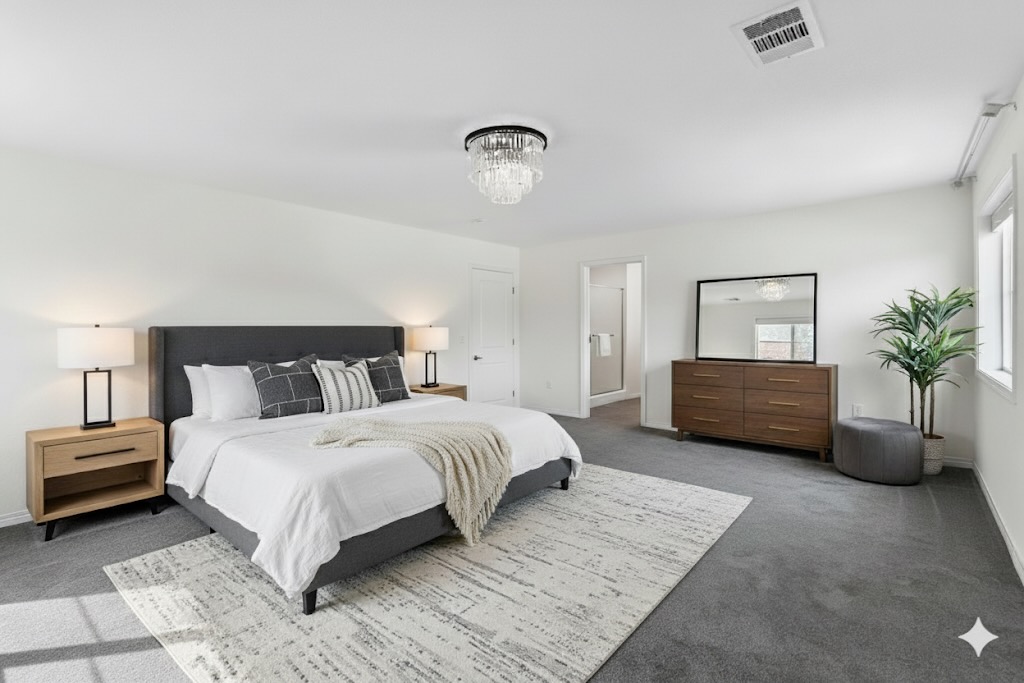 Undisclosed Address Austin, TX 78747 - Photo 13 of 28 a bedroom with a bed a couch and potted plant