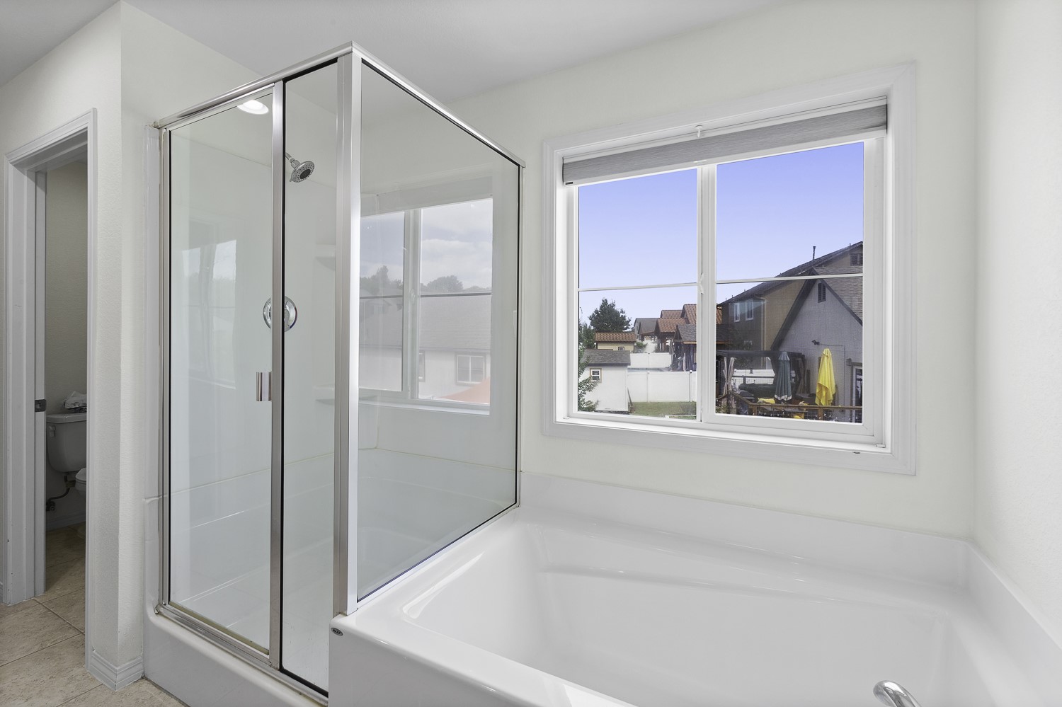 Undisclosed Address Austin, TX 78747 - Photo 15 of 28 a bathroom with a bathtub and a shower