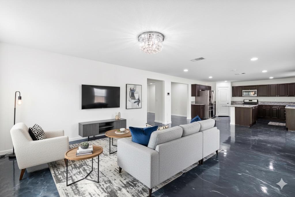 Undisclosed Address Austin, TX 78747 - Photo 2 of 28 a living room with furniture and a flat screen tv