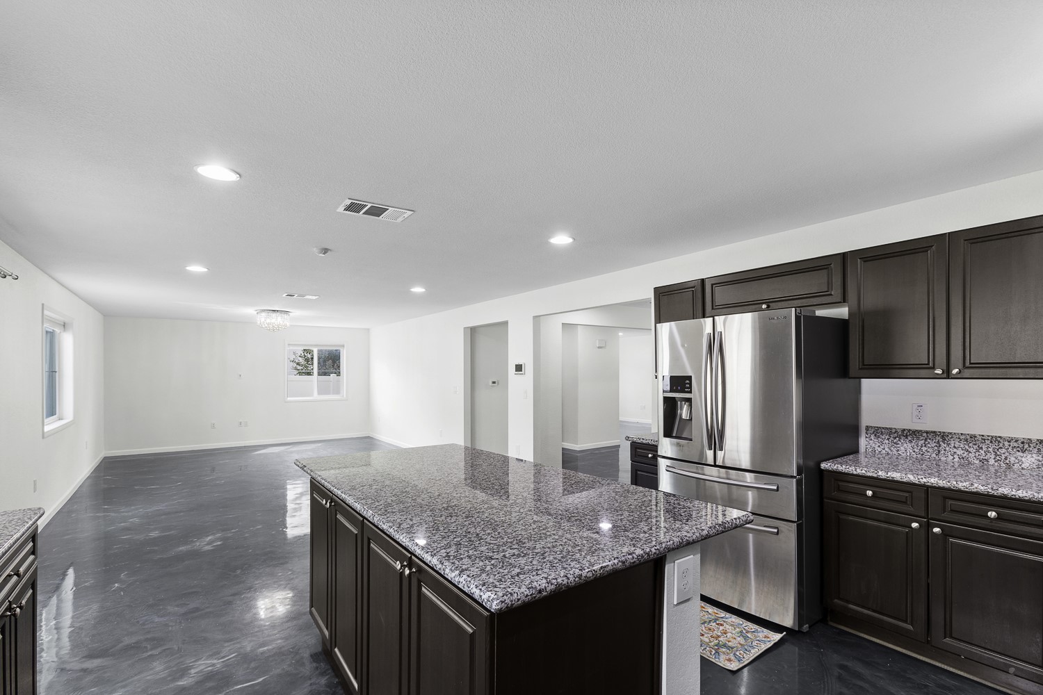 Undisclosed Address Austin, TX 78747 - Photo 28 of 28 a kitchen with stainless steel appliances granite countertop a sink refrigerator and cabinets