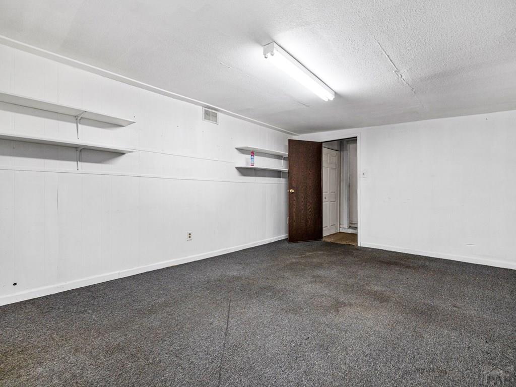 2610 Azalea Street Pueblo, CO 81005 - Photo 16 of 19 a view of an empty room