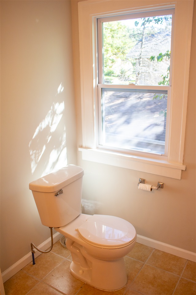 2017 Rural Street Rockford, IL 61107 - Photo 15 of 21 a bathroom with a toilet and a window