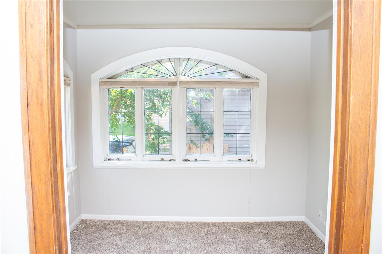 2017 Rural Street Rockford, IL 61107 - Photo 2 of 21 an empty room with a window
