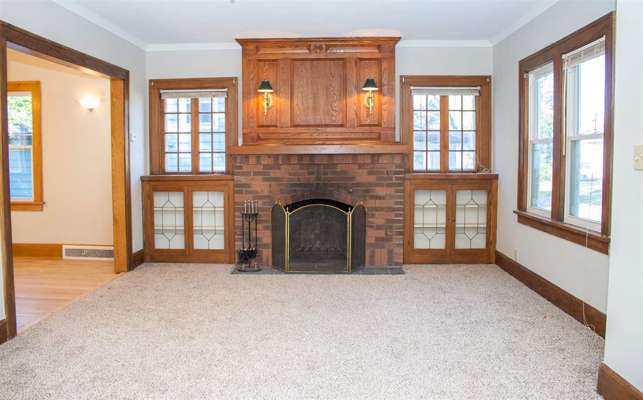 2017 Rural Street Rockford, IL 61107 - Photo 3 of 21 a view of an empty room with window and kitchen view