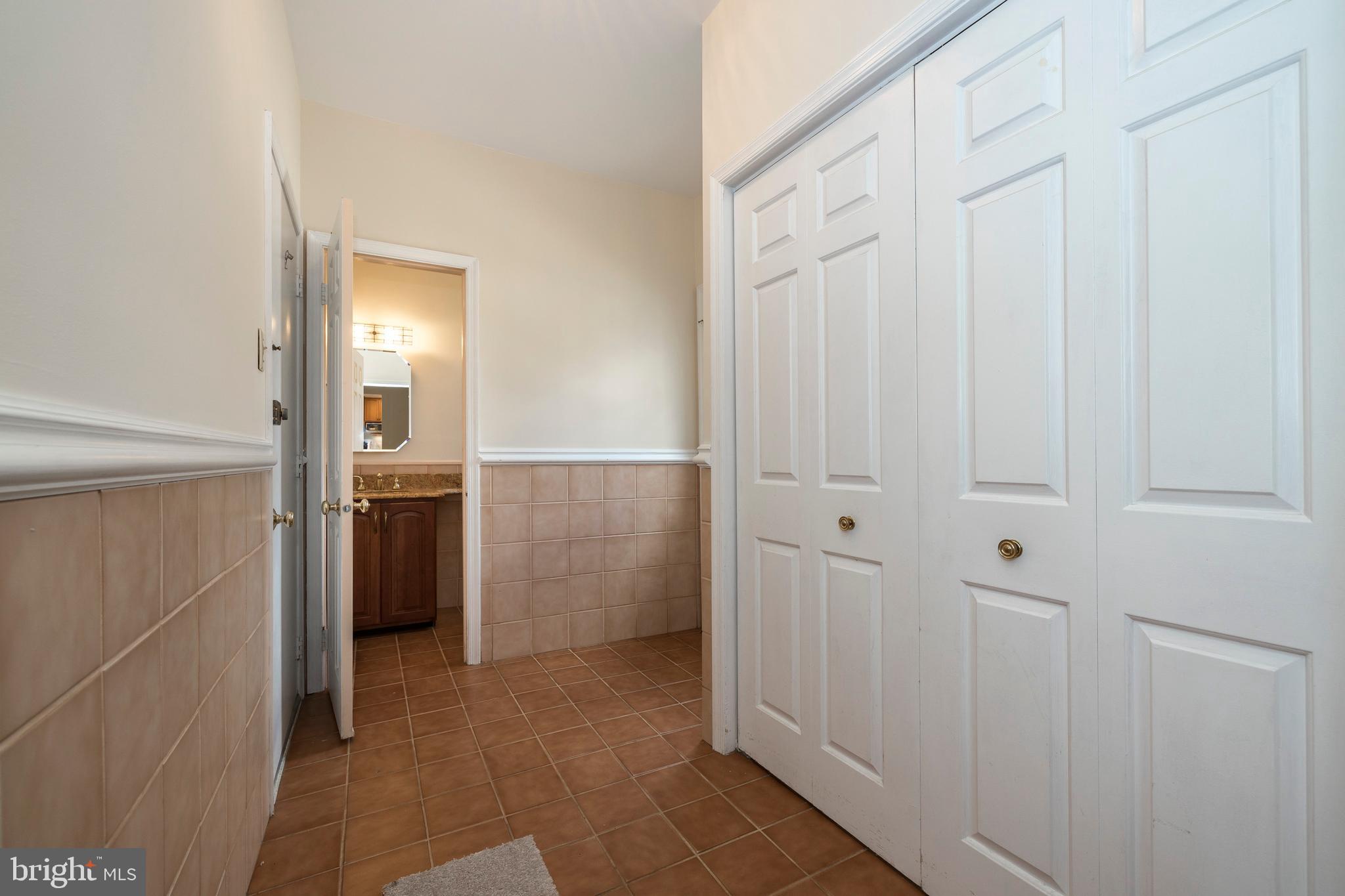 7 Krauser Road Downingtown, PA 19335 - Photo 22 of 55 Hall from Fam. Rm to Back Door, 1/2 Bath &Garage