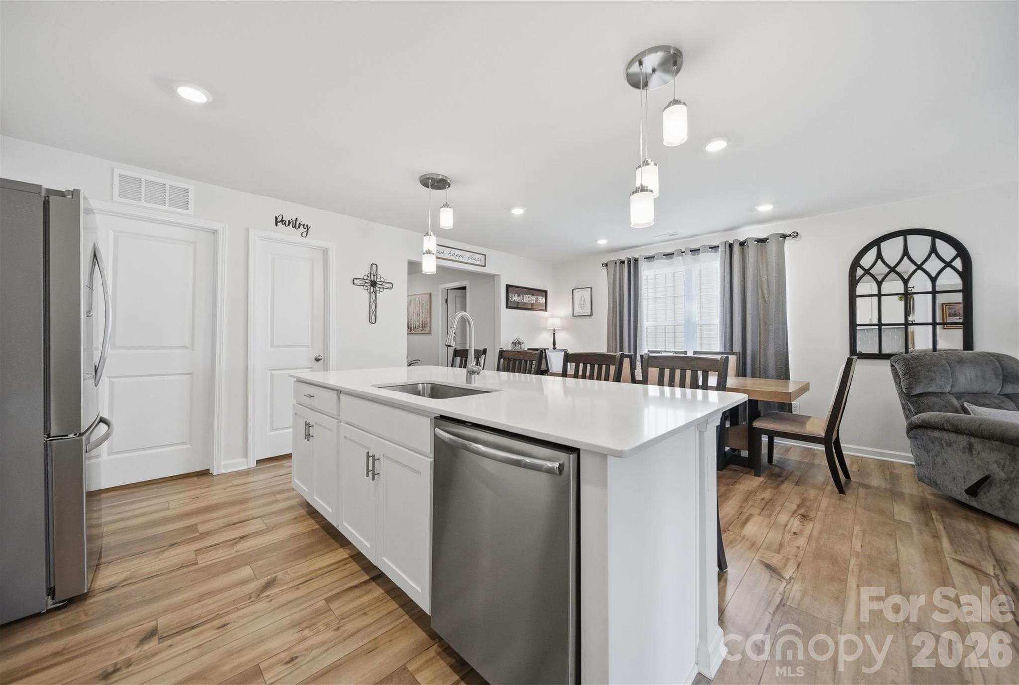 2841 Legacy Rdg Lane Catawba, NC 28609 - Photo 15 of 42 a large kitchen with kitchen island a island a sink stainless steel appliances and cabinets