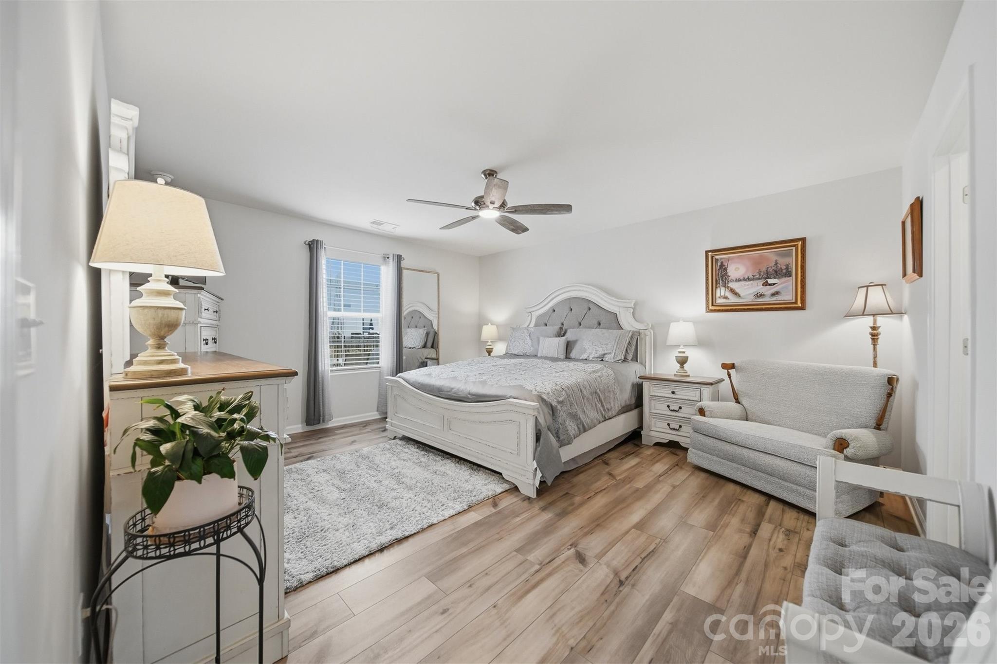 2841 Legacy Rdg Lane Catawba, NC 28609 - Photo 19 of 42 a bedroom with a large bed and a couch