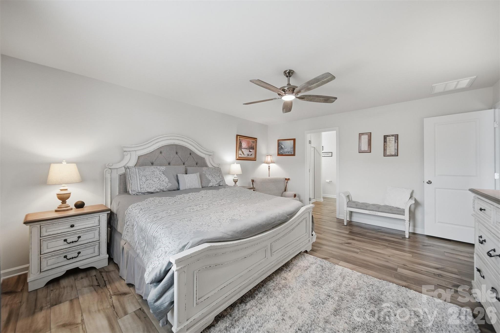 2841 Legacy Rdg Lane Catawba, NC 28609 - Photo 20 of 42 a spacious bedroom with a bed and a chandelier