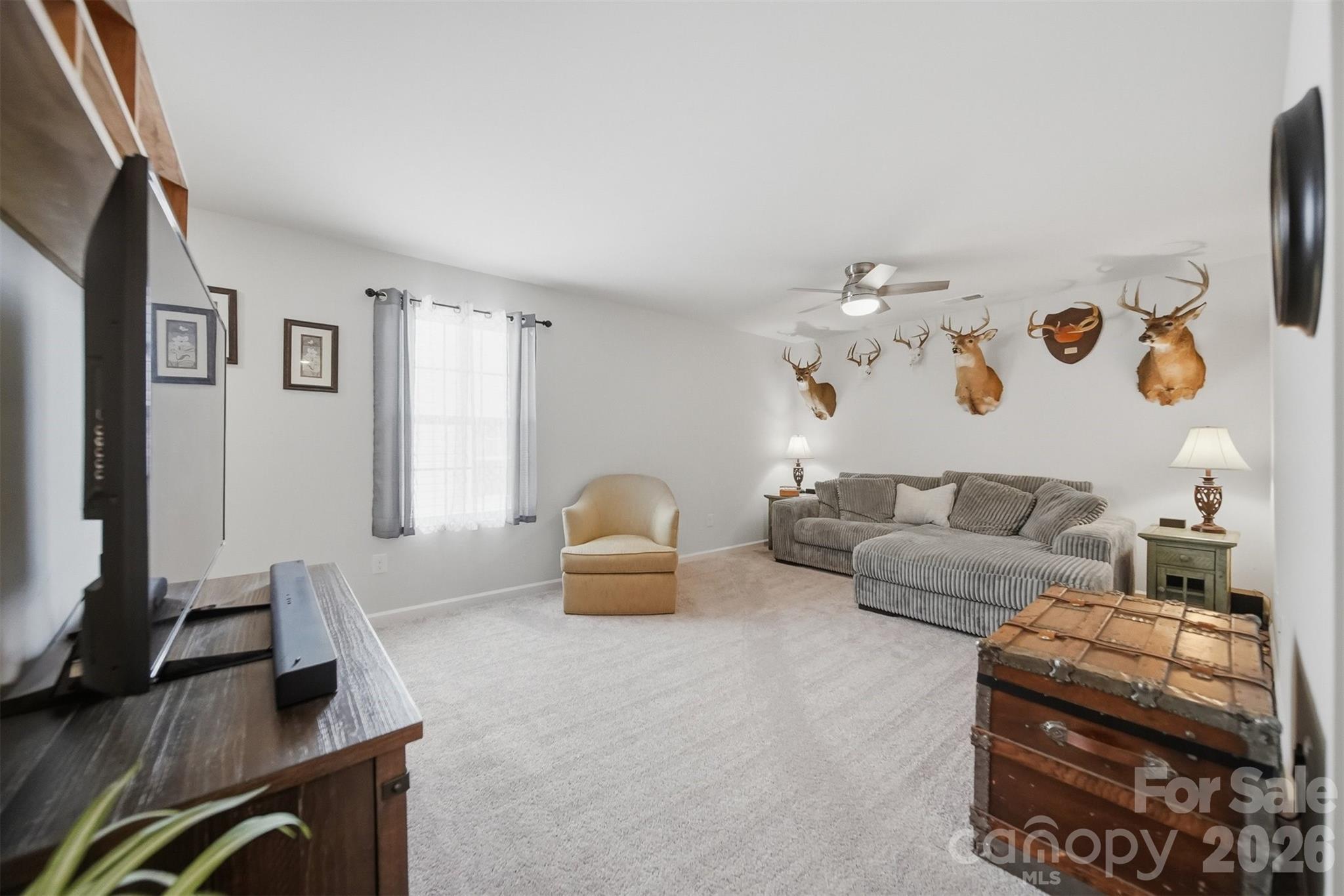 2841 Legacy Rdg Lane Catawba, NC 28609 - Photo 26 of 42 a living room with furniture and a flat screen tv