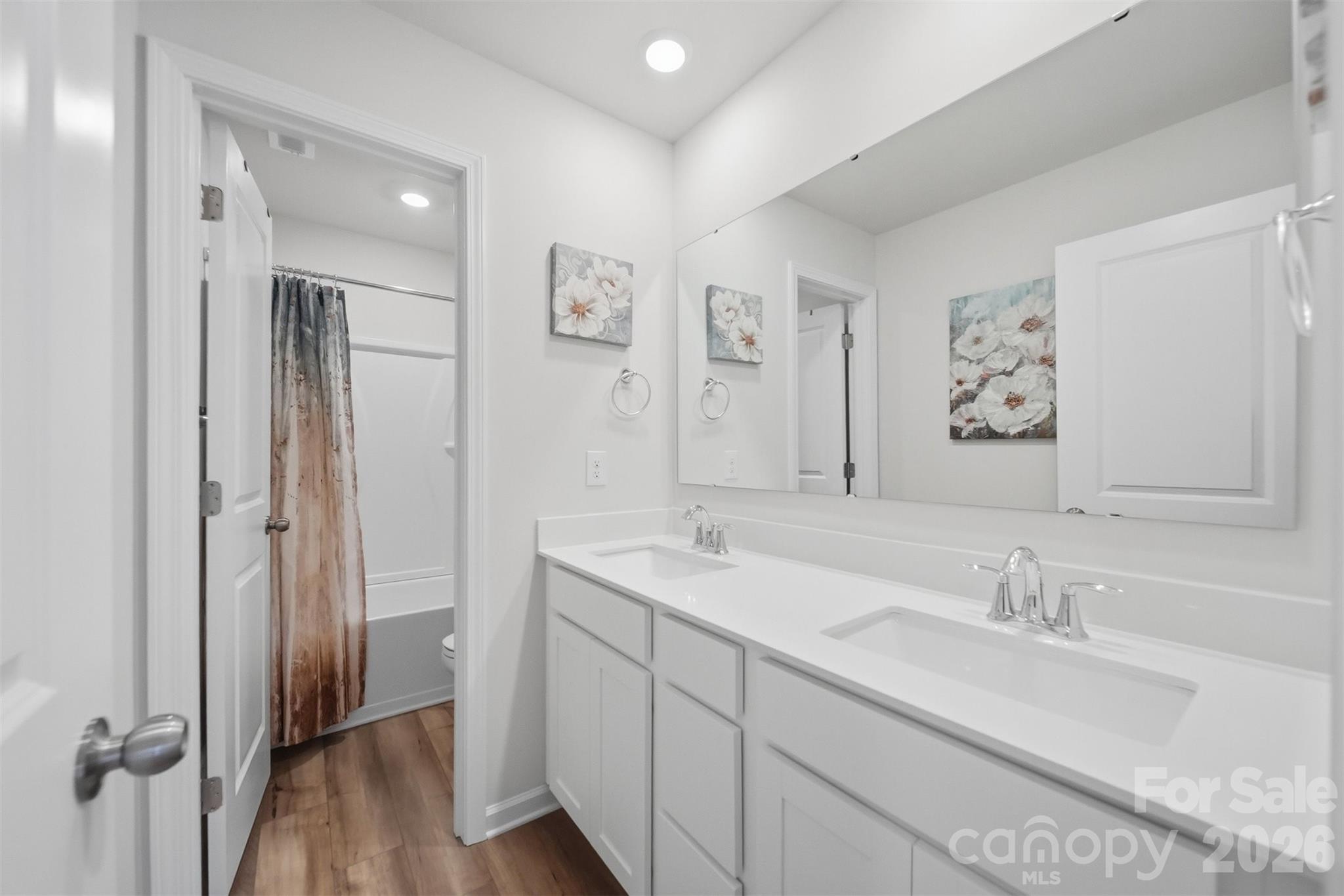 2841 Legacy Rdg Lane Catawba, NC 28609 - Photo 27 of 42 a bathroom with a sink and a mirror
