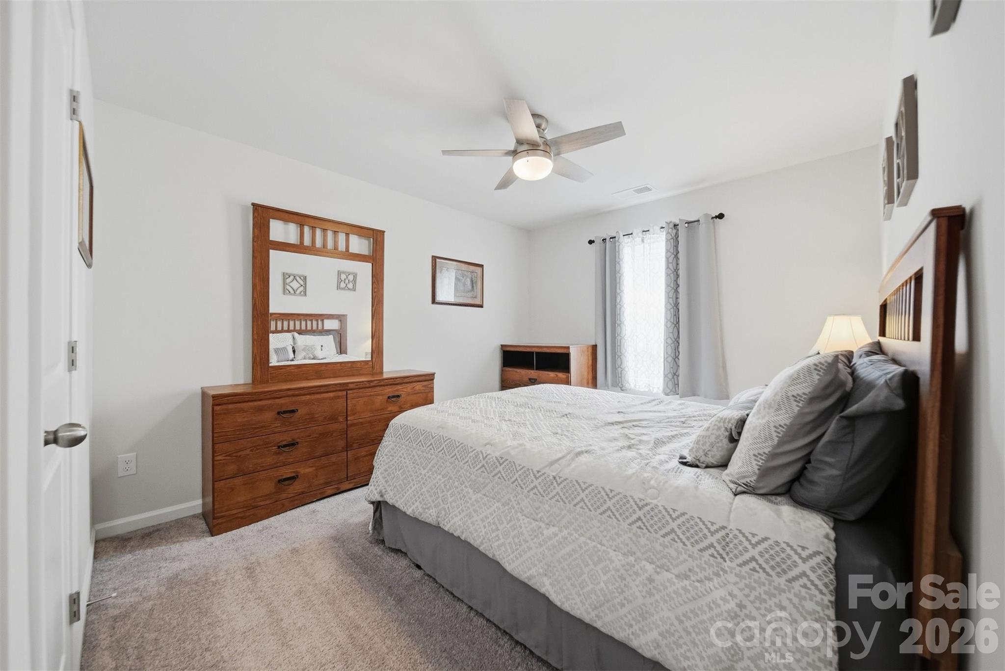 2841 Legacy Rdg Lane Catawba, NC 28609 - Photo 28 of 42 a bedroom with a bed and a dresser