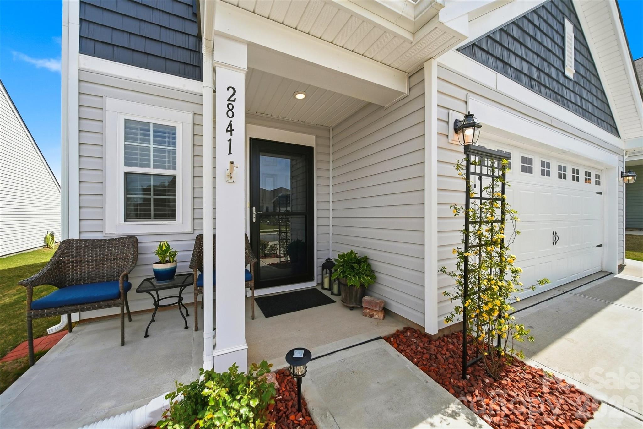 2841 Legacy Rdg Lane Catawba, NC 28609 - Photo 3 of 42 a backyard of a house with outdoor seating