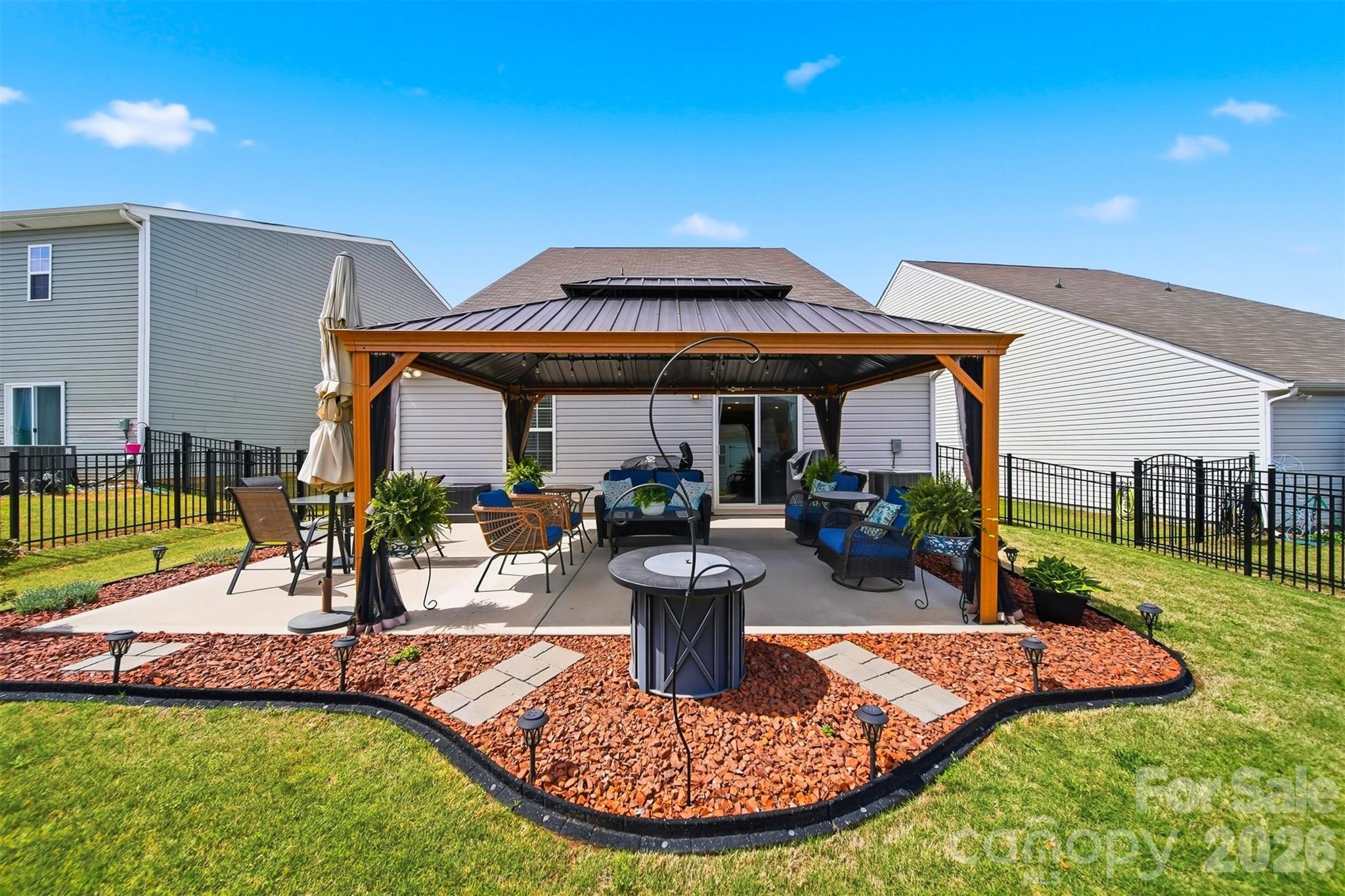 2841 Legacy Rdg Lane Catawba, NC 28609 - Photo 32 of 42 a view of a house with backyard swimming pool and sitting area