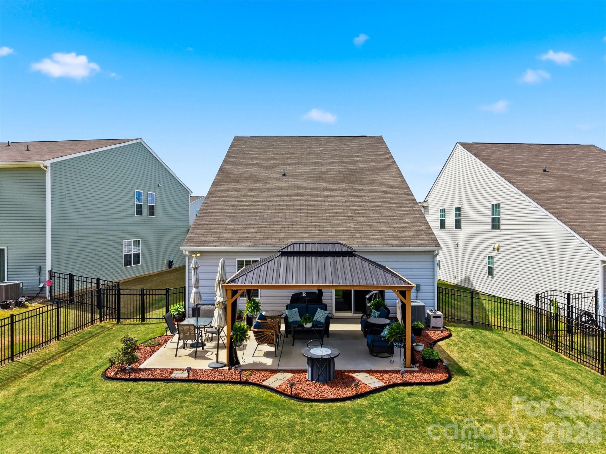 2841 Legacy Rdg Lane Catawba, NC 28609 - Photo 36 of 42 a view of a house with backyard porch and sitting area