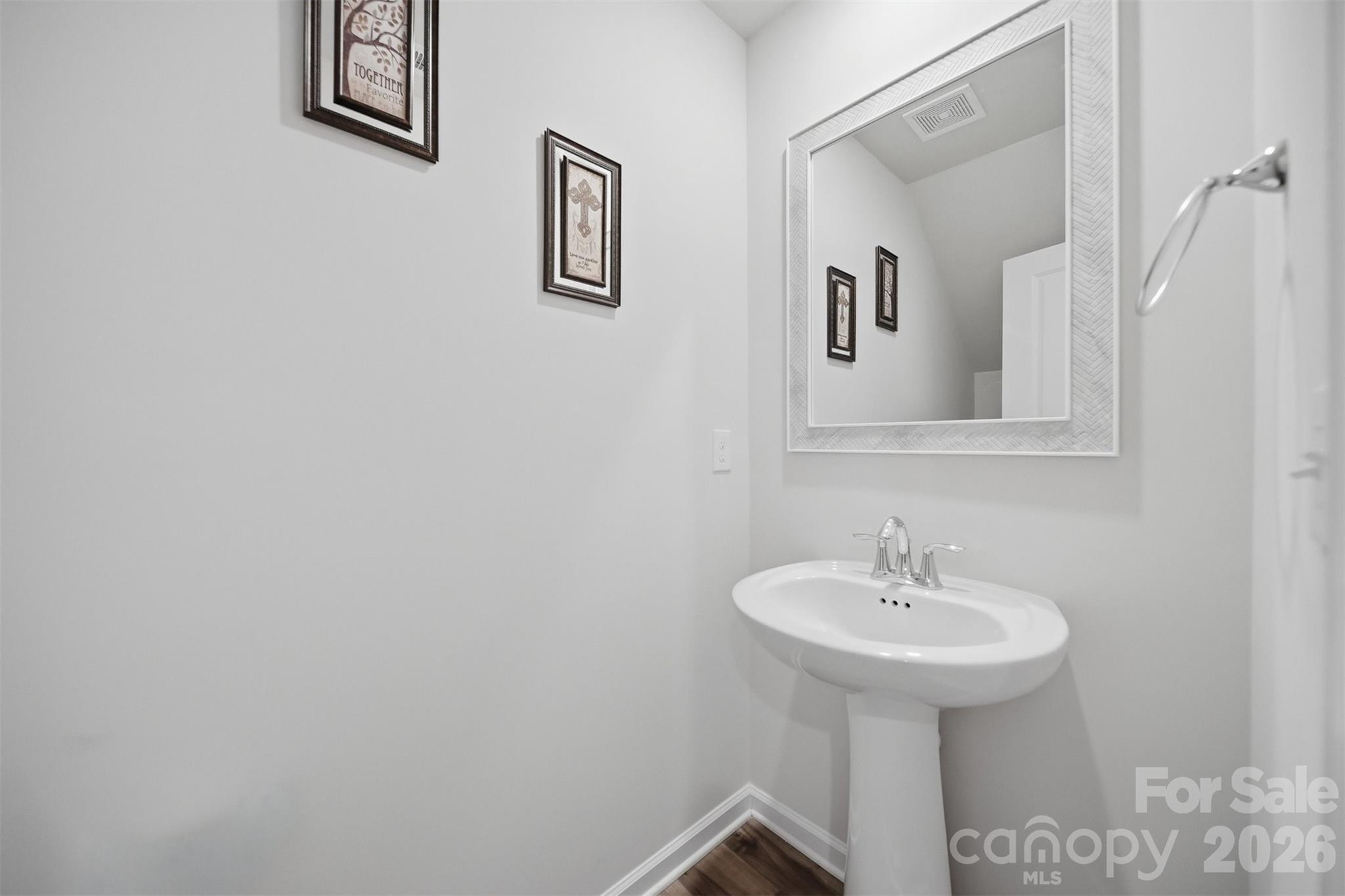 2841 Legacy Rdg Lane Catawba, NC 28609 - Photo 6 of 42 a bathroom with a sink and a mirror