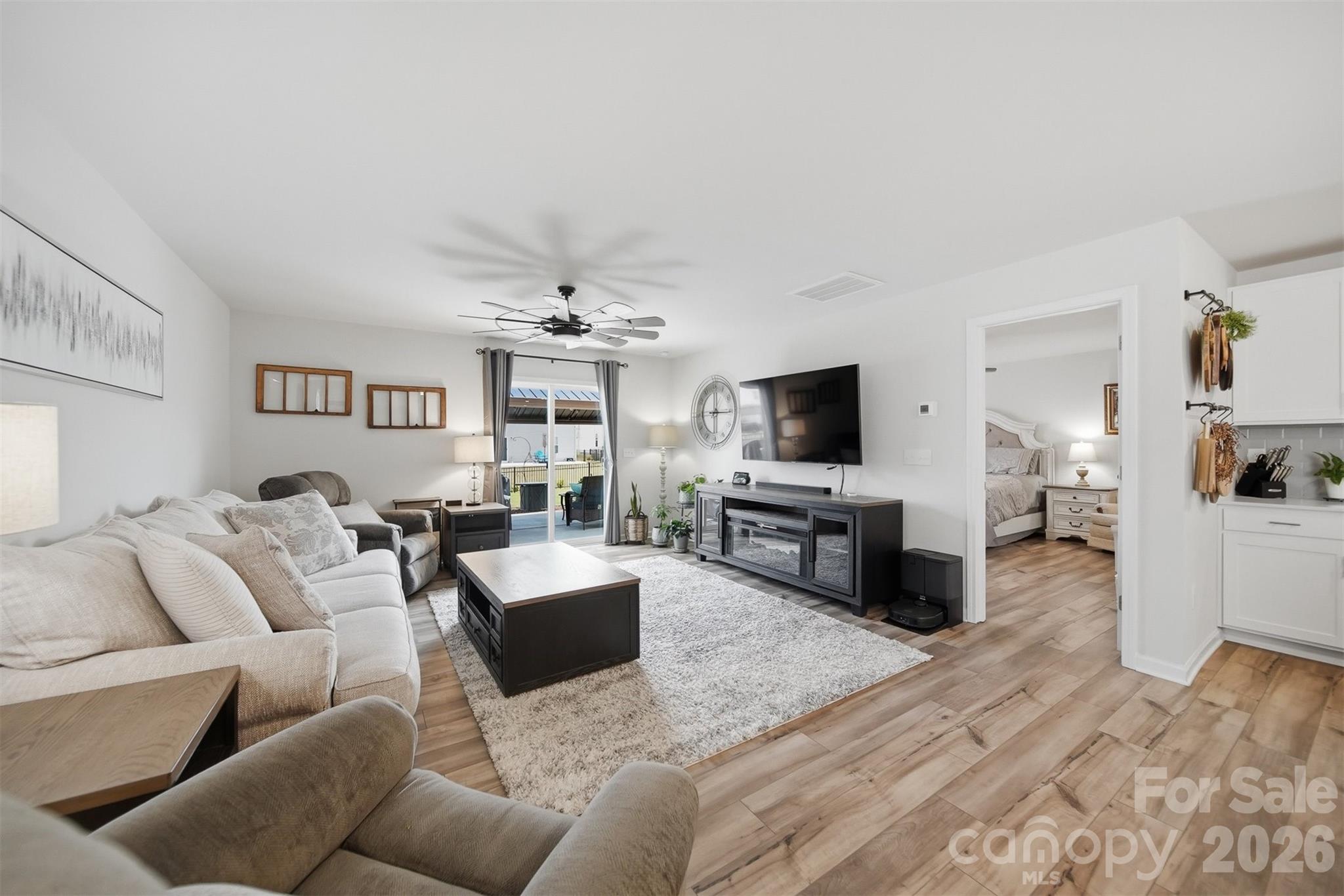 2841 Legacy Rdg Lane Catawba, NC 28609 - Photo 8 of 42 a living room with furniture a flat screen tv and kitchen view