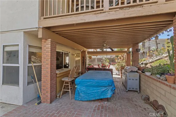 a view of a porch with furniture