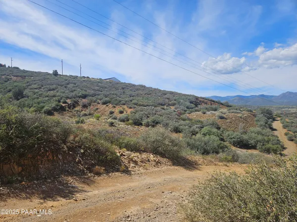 a view of mountain view with mountains in the background