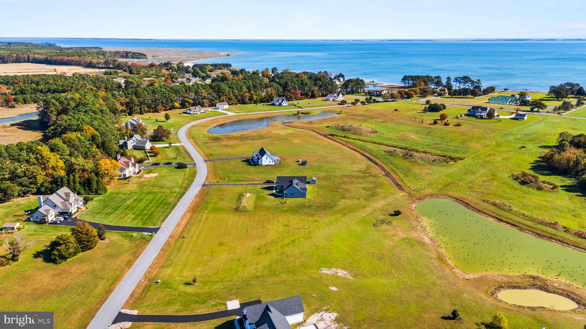 Lot 24 Sea Biscuit Road Snow Hill, MD 21863 - Photo 7 of 13 a view of a swimming pool with an ocean view