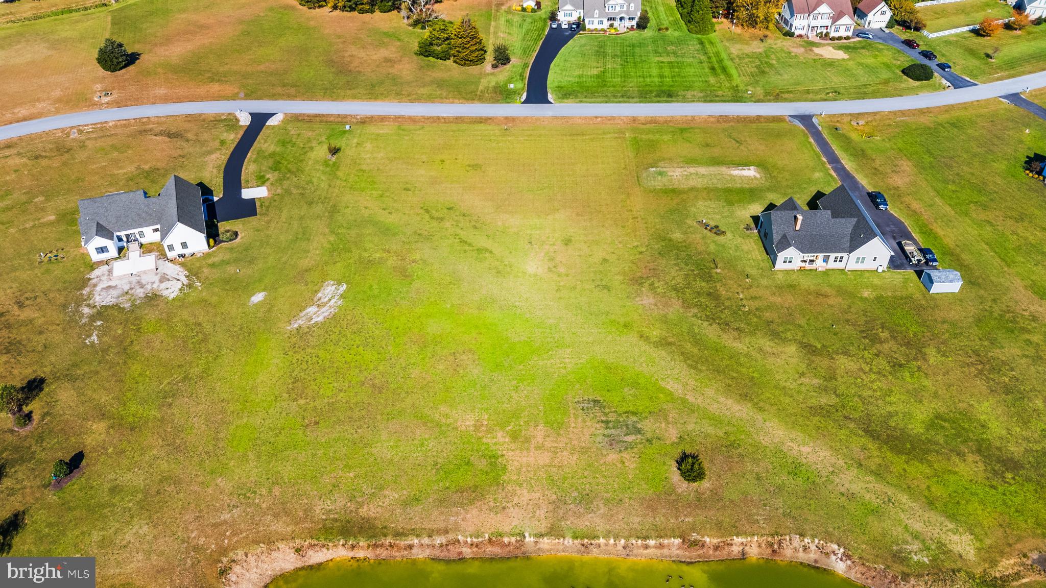 Lot 24 Sea Biscuit Road Snow Hill, MD 21863 - Photo 10 of 13 a view of a swimming pool with an outdoor space