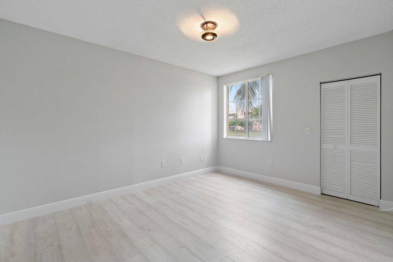 7950 North Nob Hill Road, Unit 206 Tamarac, FL 33321 - Photo 18 of 41 Master Bedroom