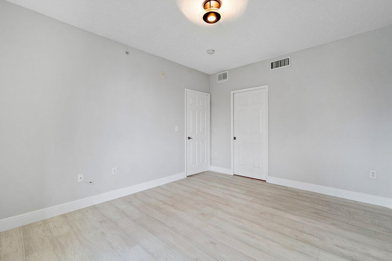7950 North Nob Hill Road, Unit 206 Tamarac, FL 33321 - Photo 19 of 41 Master Bedroom