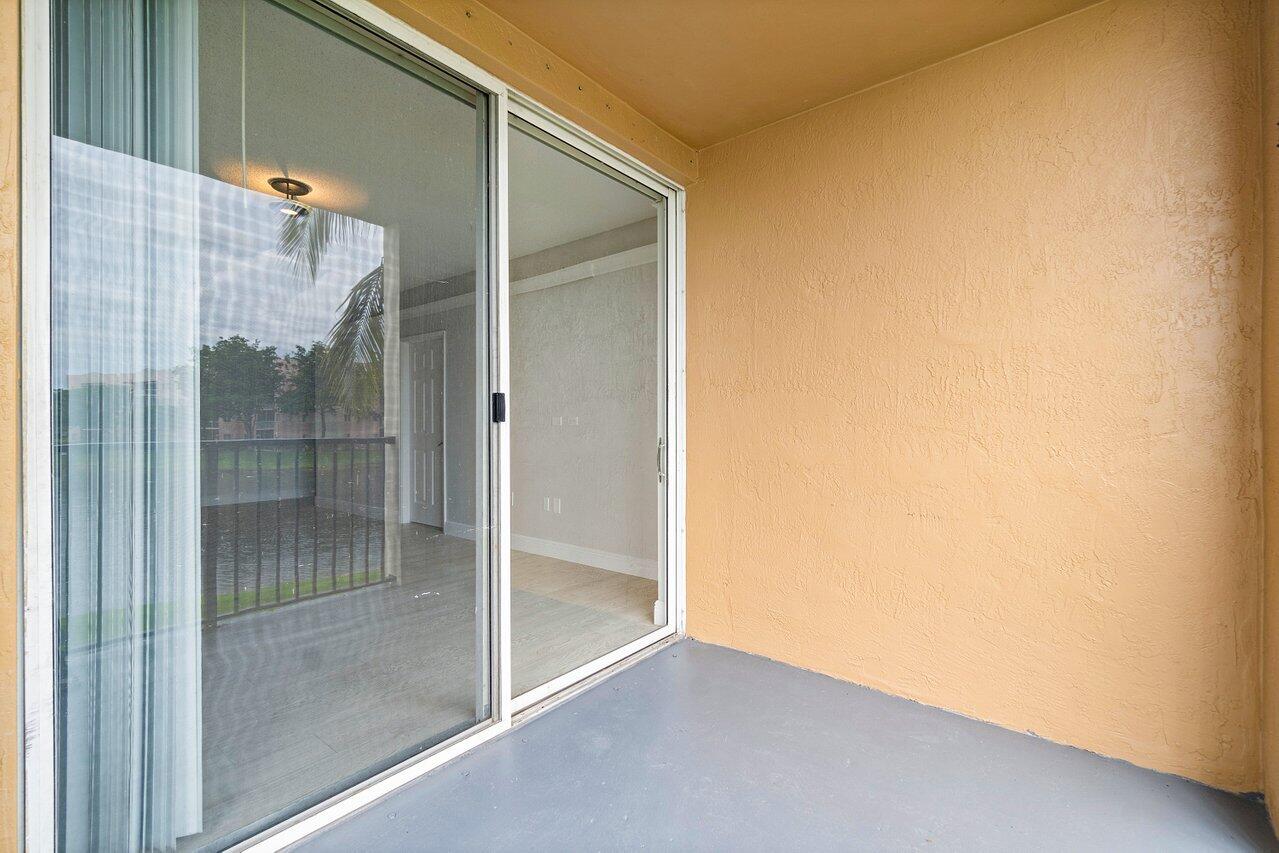 7950 North Nob Hill Road, Unit 206 Tamarac, FL 33321 - Photo 26 of 41 Patio