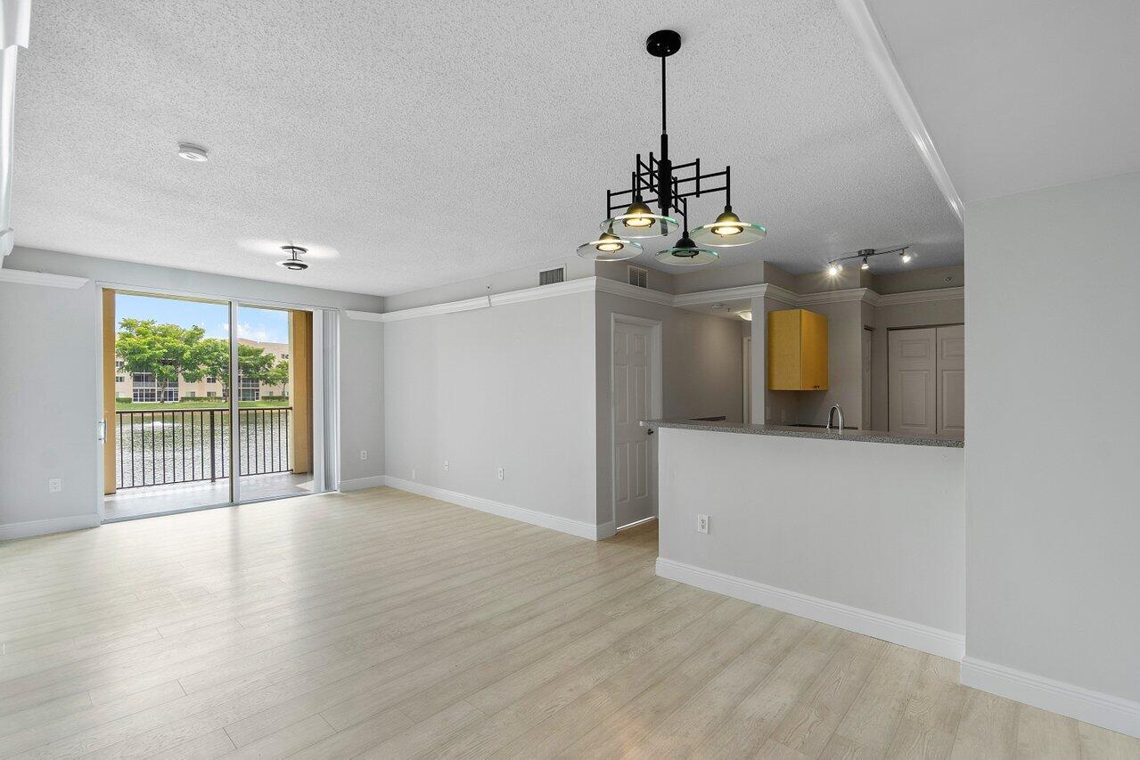 7950 North Nob Hill Road, Unit 206 Tamarac, FL 33321 - Photo 4 of 41 Living Room