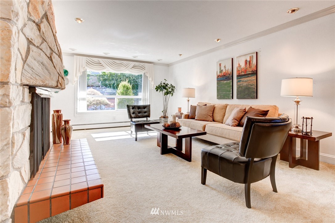 2347 North 64th Street Seattle, WA 98103 - Photo 11 of 25 a living room with furniture and a large window