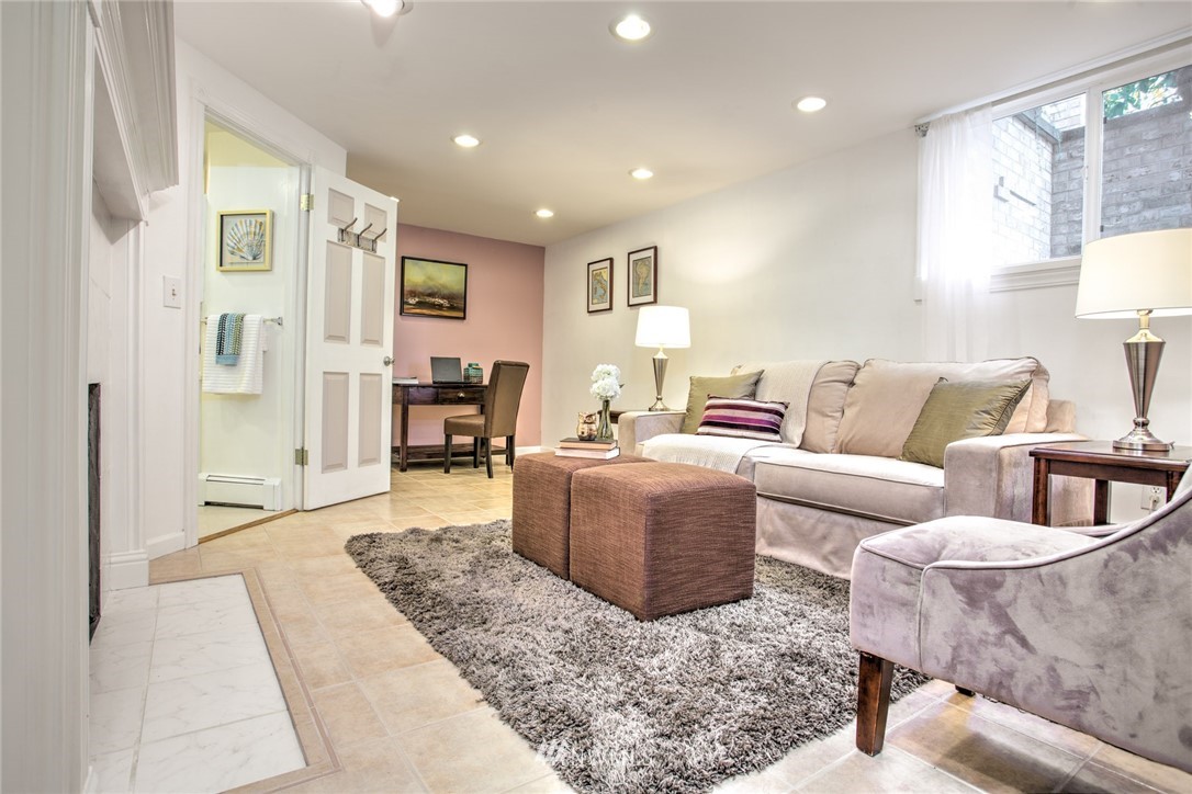 2347 North 64th Street Seattle, WA 98103 - Photo 13 of 25 a living room with furniture and a couch
