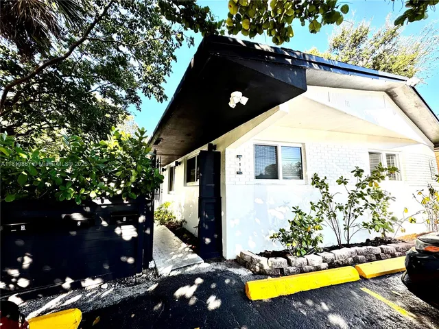a view of swimming pool with two chairs