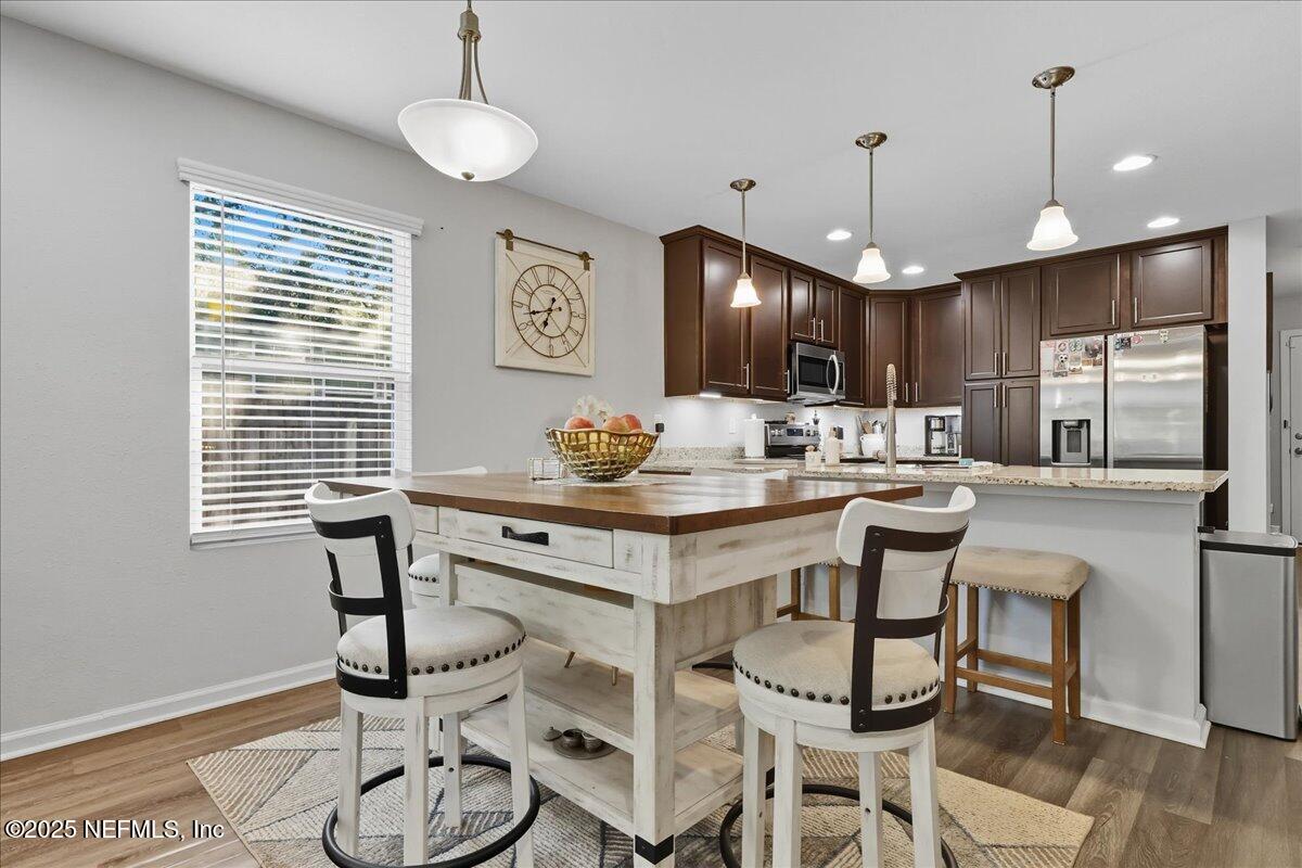10441 Bradley Road Jacksonville, FL 32246 - Photo 6 of 19 05-Dining to Kitchen