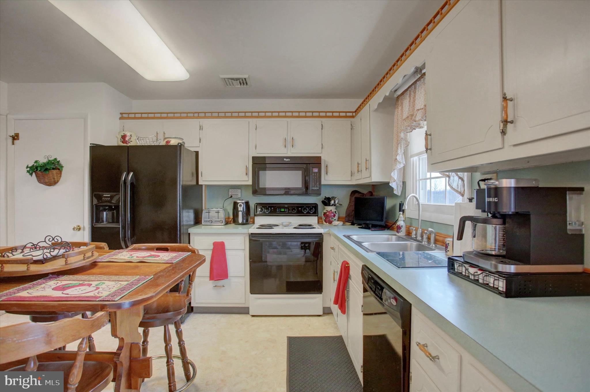 600 Shippensburg Road Shippensburg, PA 17257 - Photo 12 of 61 a kitchen that has a table and chairs in it