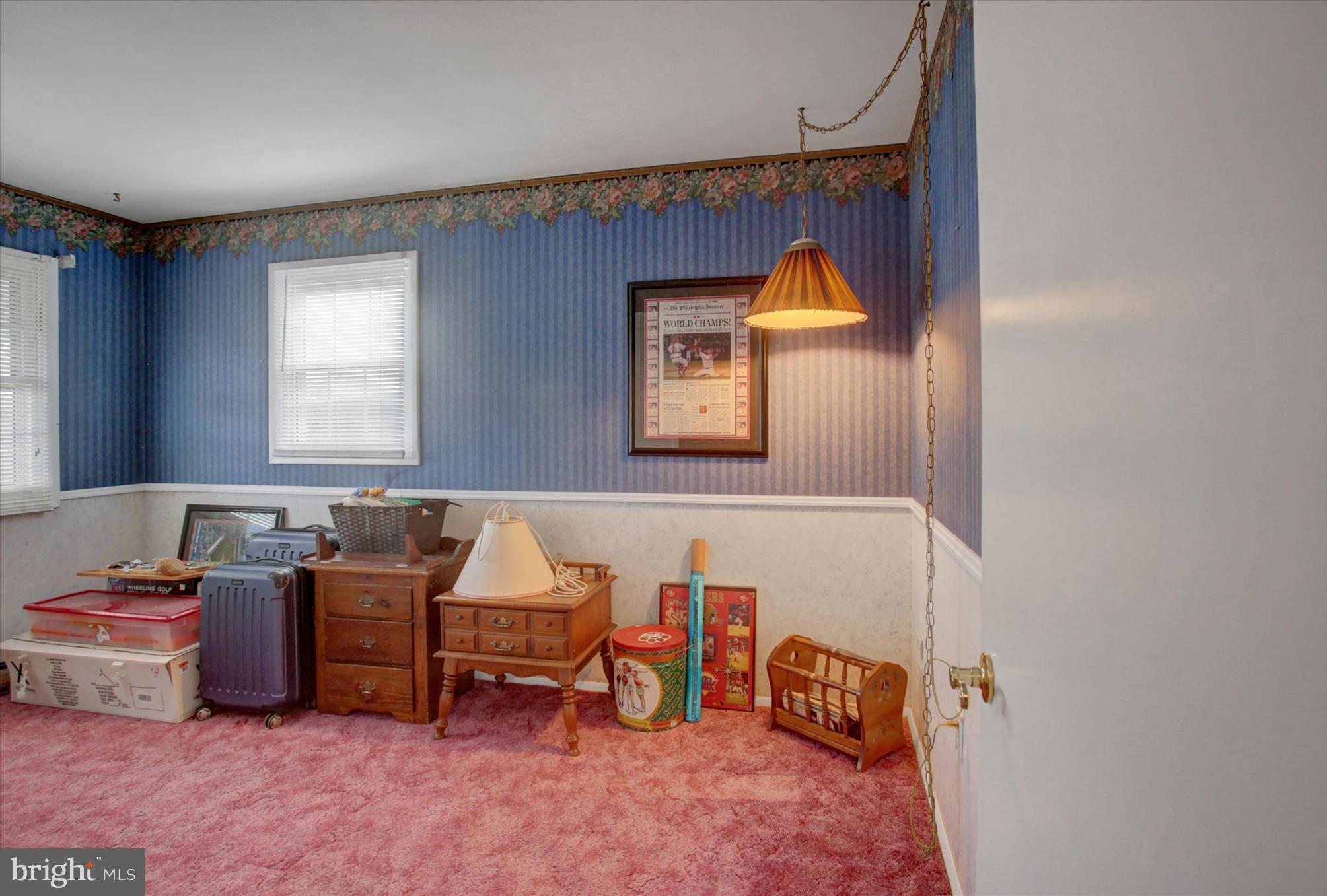 600 Shippensburg Road Shippensburg, PA 17257 - Photo 21 of 61 a living room with furniture and a lamp