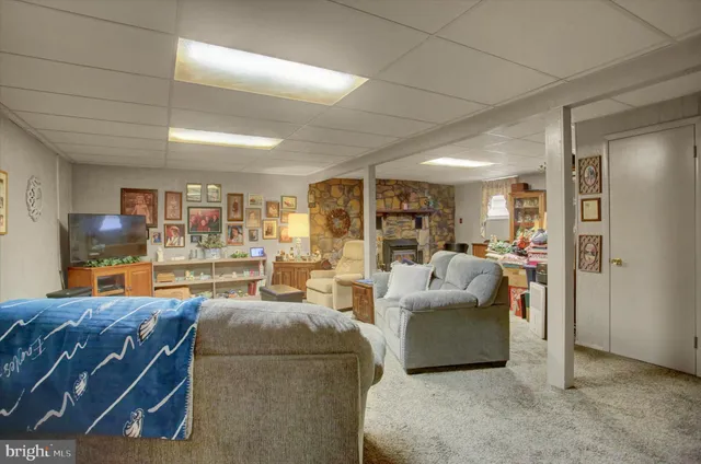 a bathroom with a sink mirror toilet and shower
