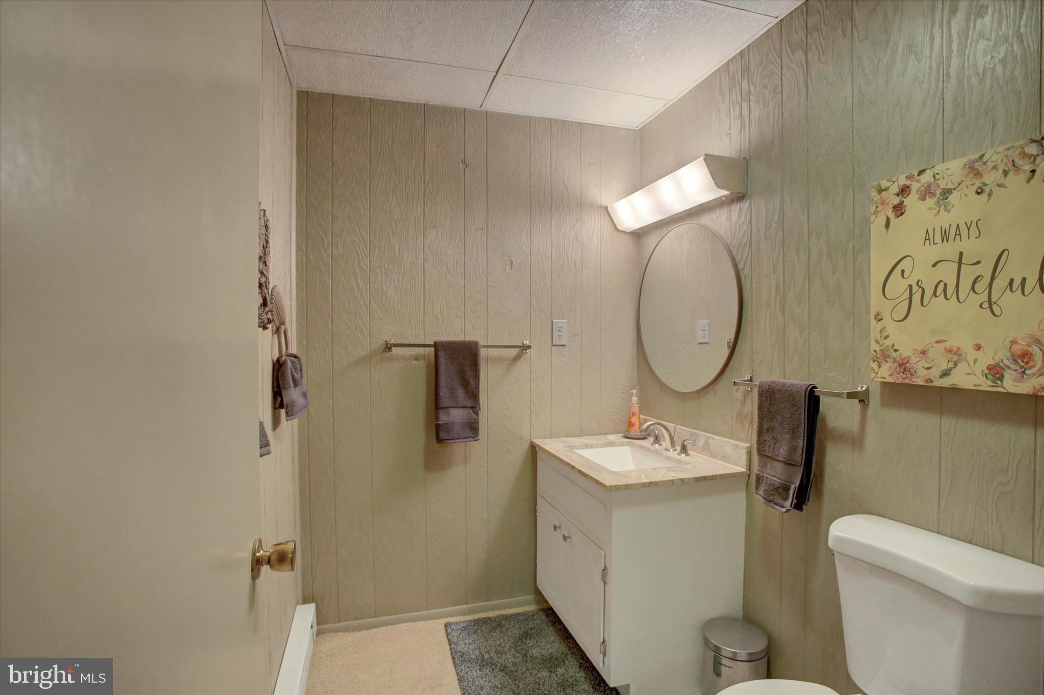 600 Shippensburg Road Shippensburg, PA 17257 - Photo 28 of 61 a bathroom with a sink mirror toilet and shower