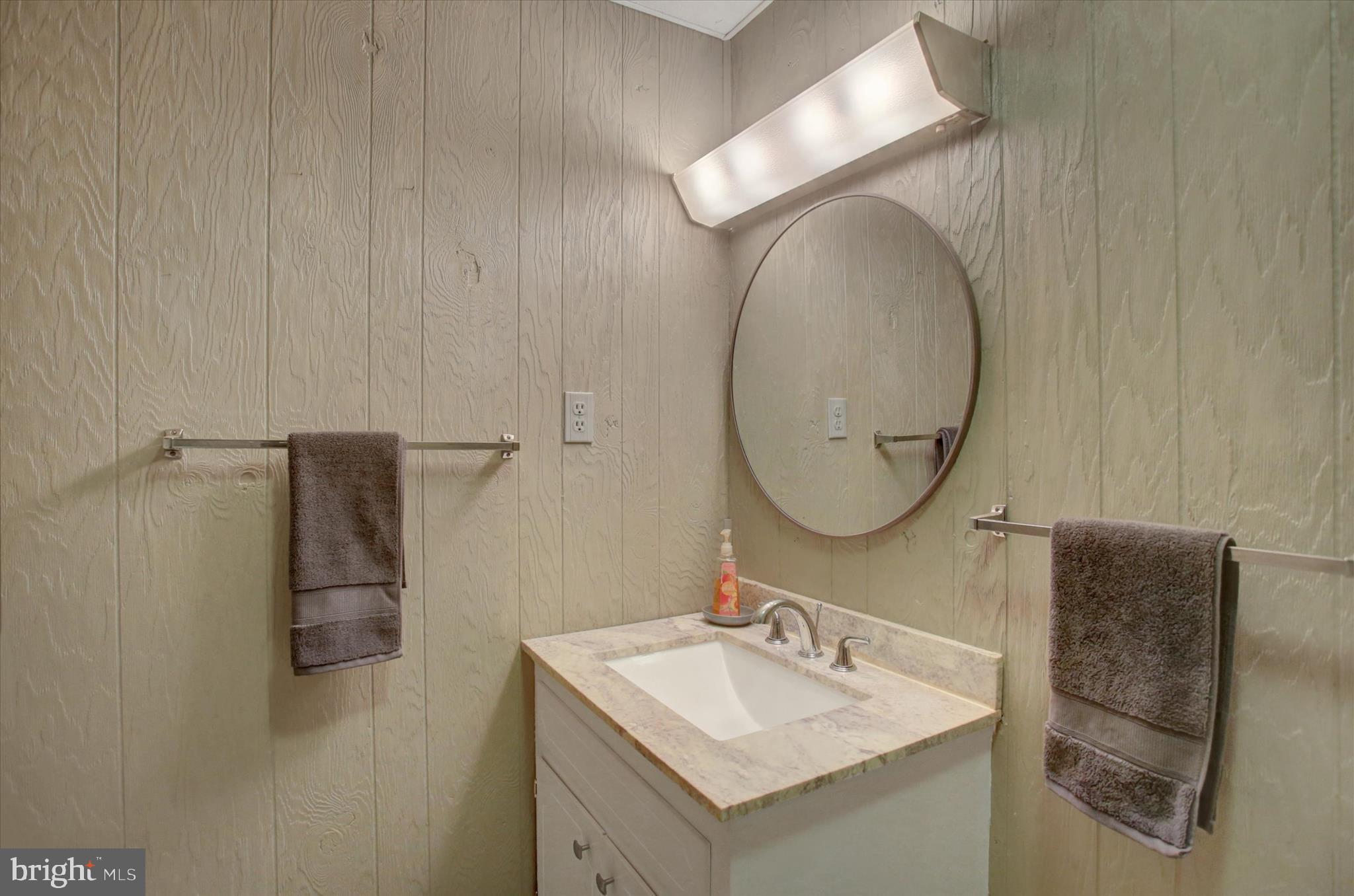 600 Shippensburg Road Shippensburg, PA 17257 - Photo 29 of 61 a bathroom with a sink vanity and a mirror