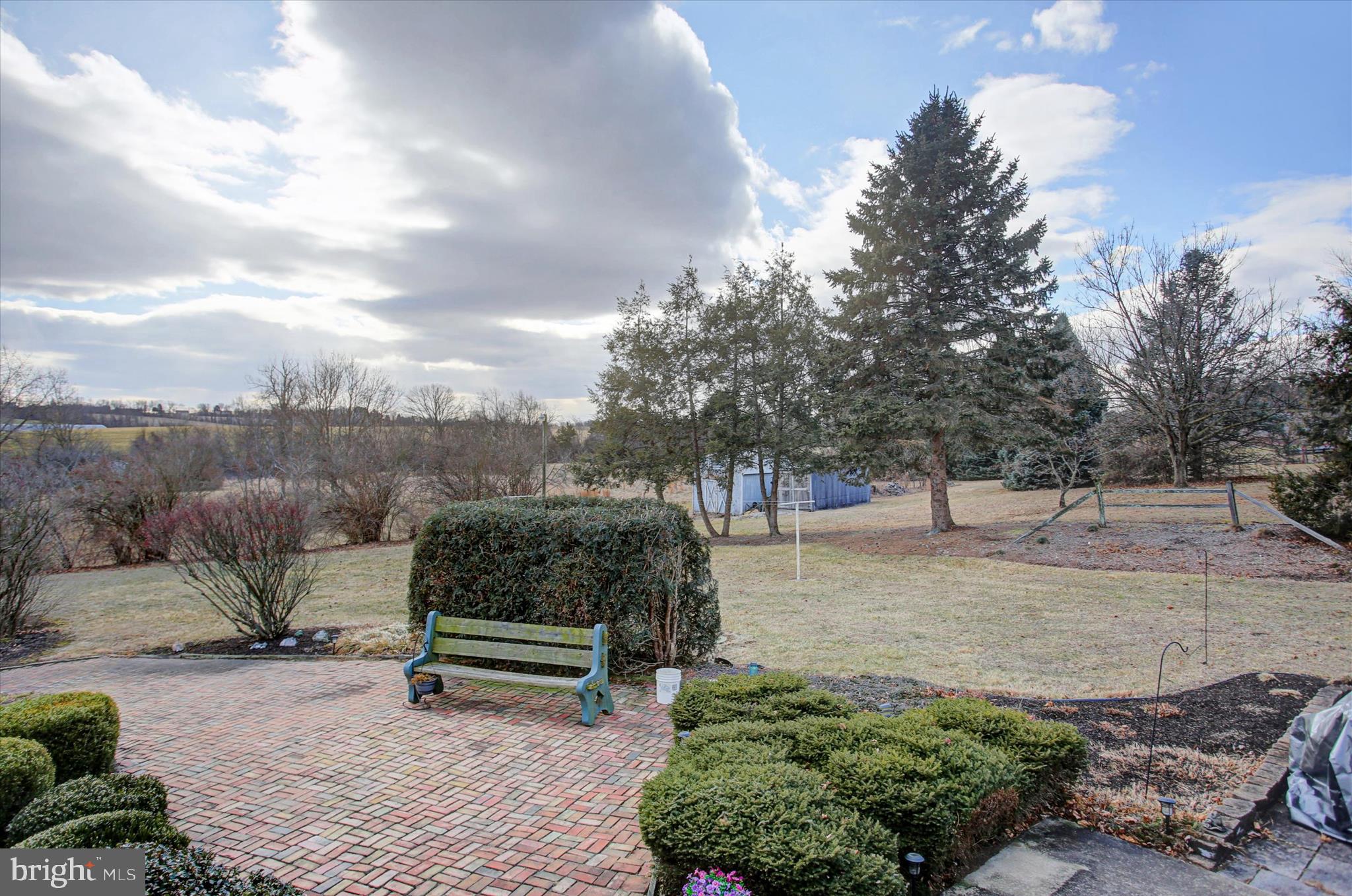600 Shippensburg Road Shippensburg, PA 17257 - Photo 43 of 61 a view of a bench in the middle of a yard