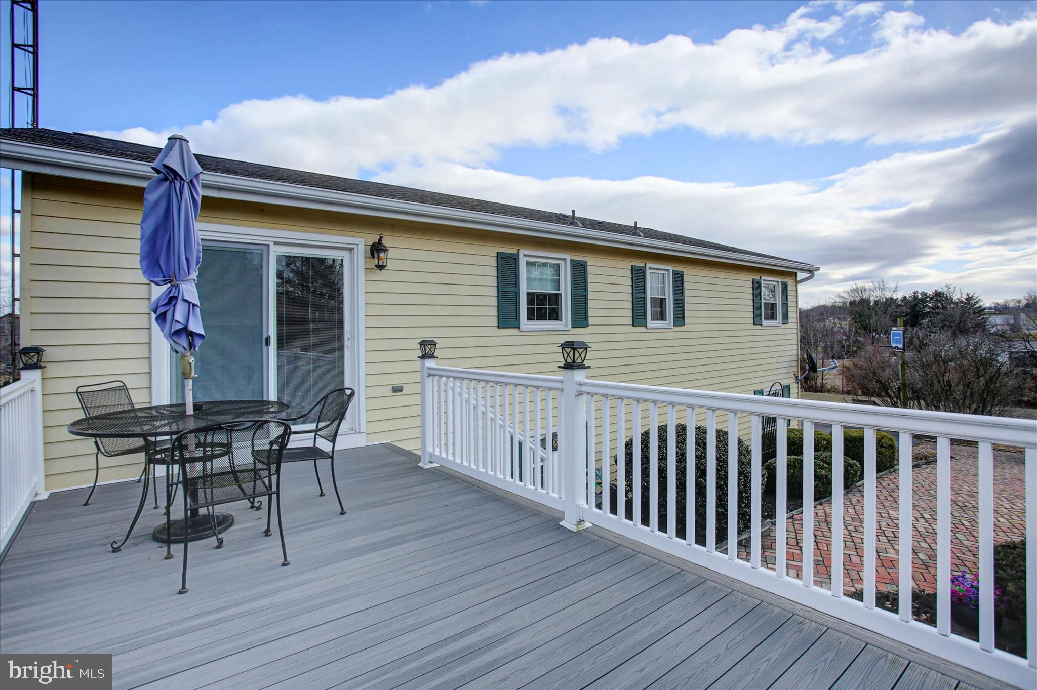 600 Shippensburg Road Shippensburg, PA 17257 - Photo 44 of 61 a view of a house with wooden deck and furniture