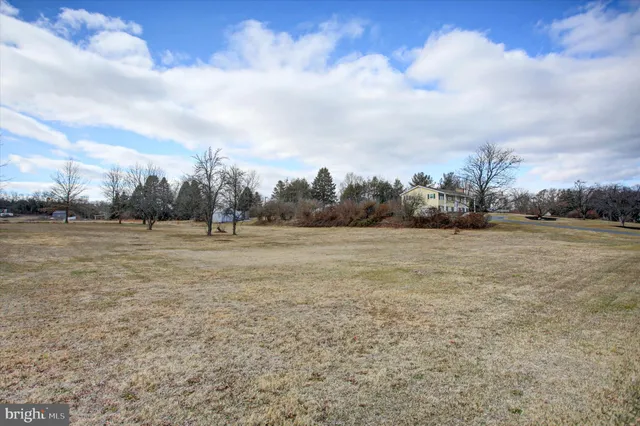 a view of a terrace with a yard covered with snow