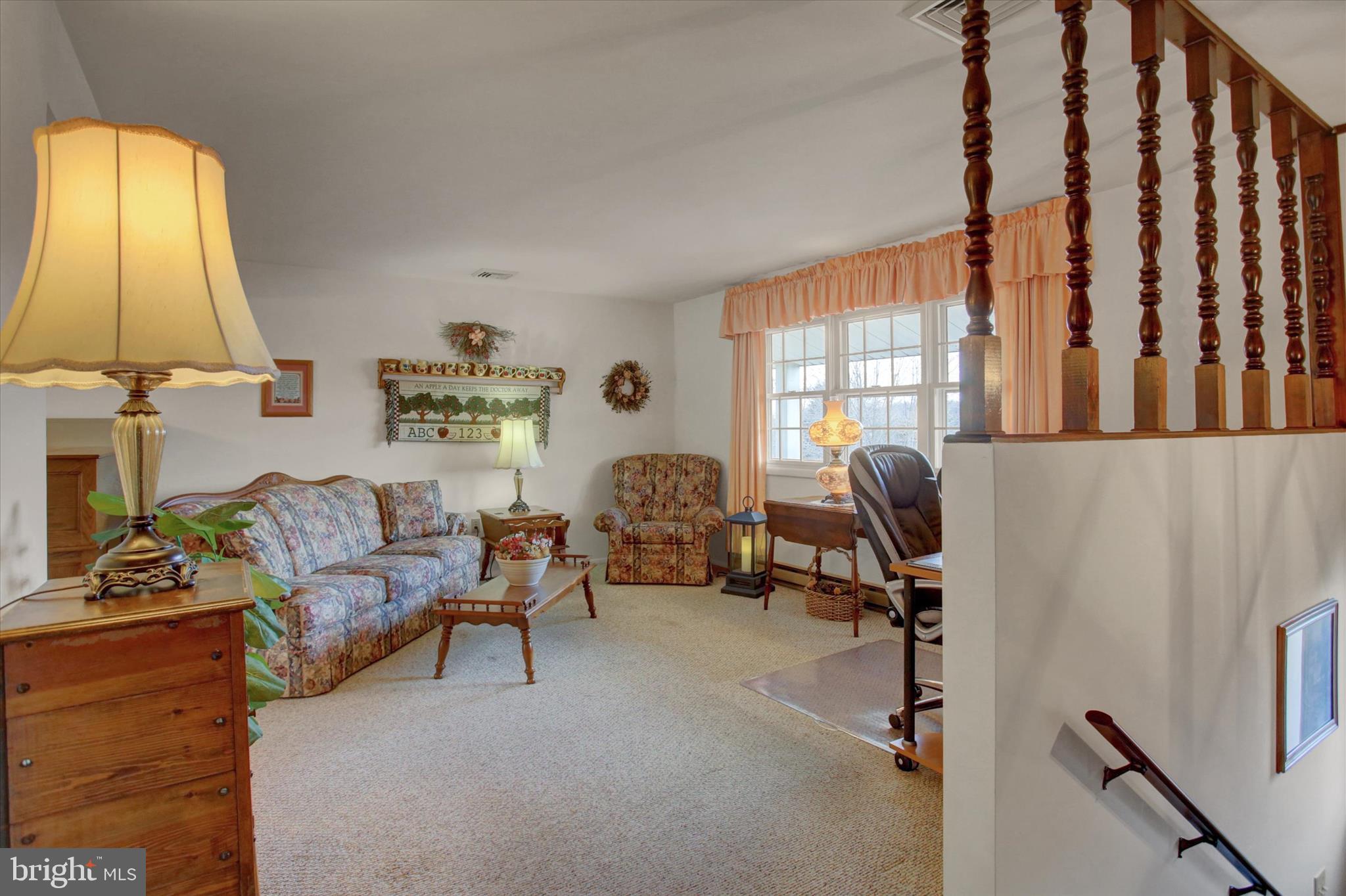 600 Shippensburg Road Shippensburg, PA 17257 - Photo 6 of 61 a living room with furniture and a window