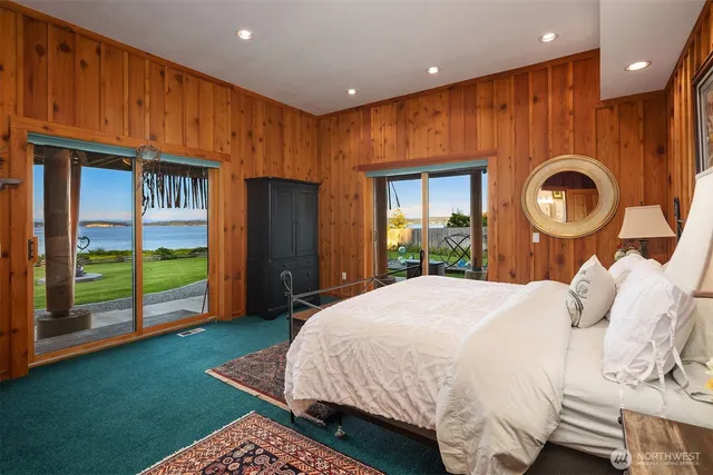 a bed room with a bed and a window