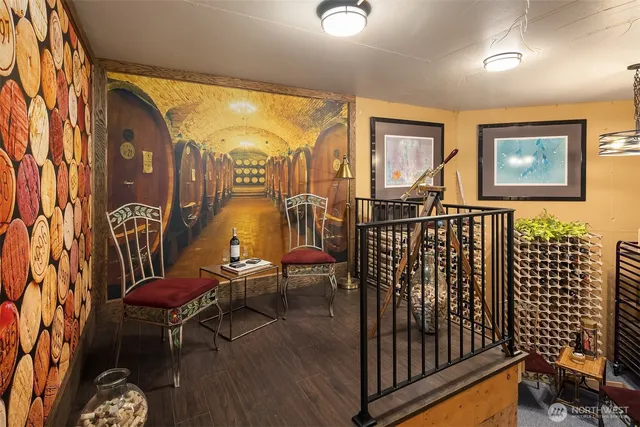 a view of a chairs and table in a balcony