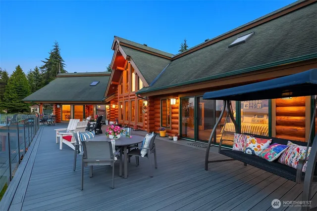 an outdoor space with seating area and furniture