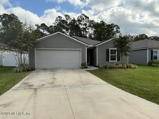 front view of house with a yard
