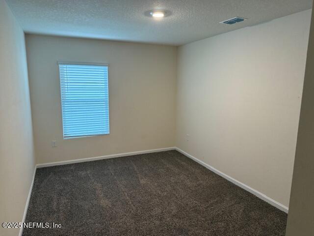 828 Morgans Treasure Road St. Augustine, FL 32084 - Photo 12 of 21 an empty room with a window